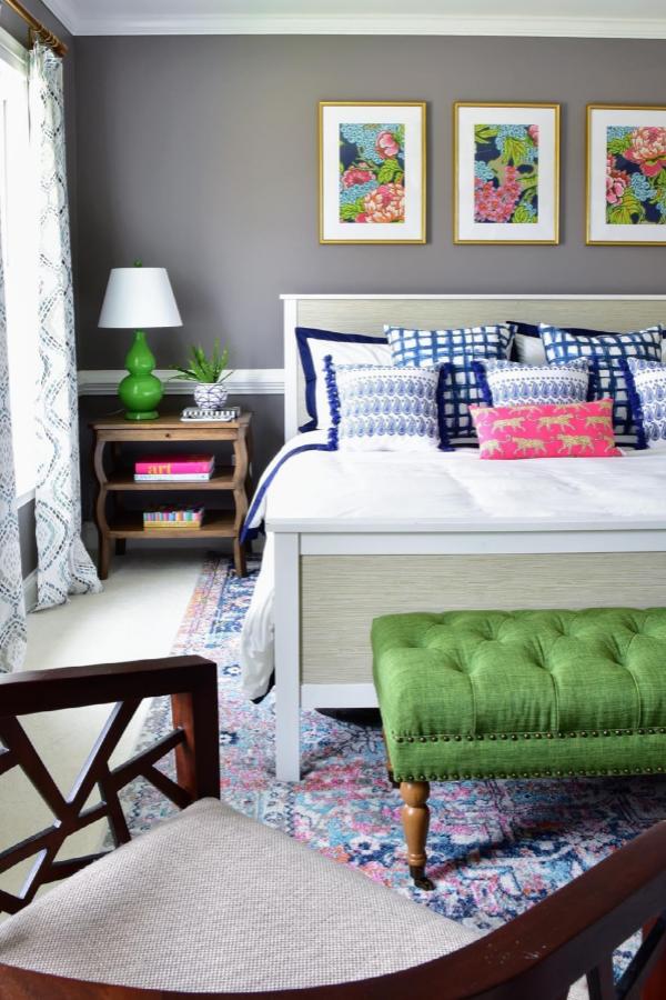 White bedroom featuring ikea hemnes bed hacks from @kate_decorates. Navy piping detail transforms basic frame.