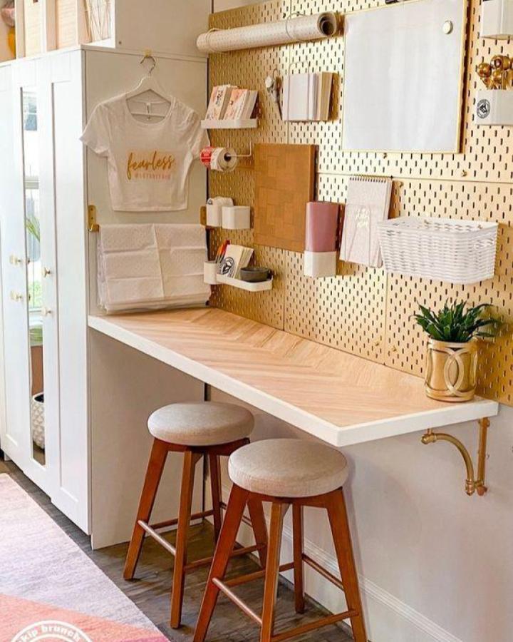 Golden pegboard bar station from Never Skip Brunch showcasing creative ikea skadis pegboard hacks & ideas with herringbone countertop.