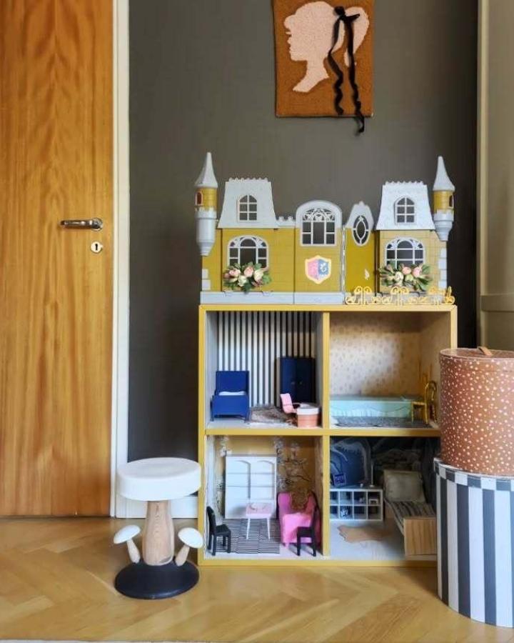 Yellow dollhouse castle storage unit from @vitriina. Creative Eket cube transformation with white cardboard details.