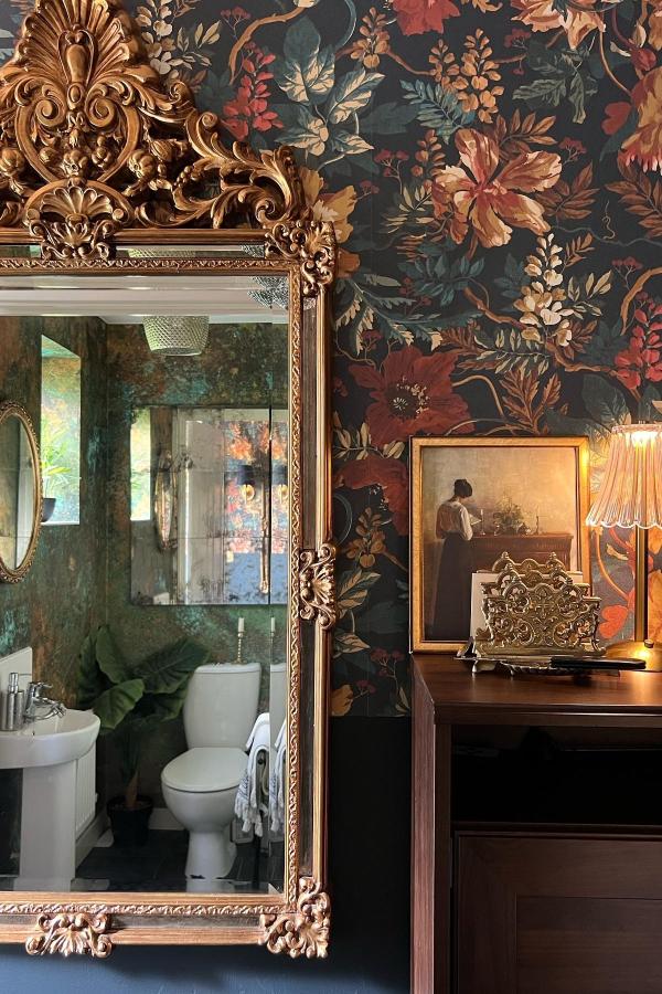 Ornate gold-framed bathroom mirror from @handmadehome_durham showcasing creative ikea mirror hacks & ideas with baroque styling.