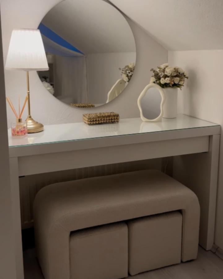 Clean white vanity setup from @mic__key_c showcasing ikea vanity hacks & ideas with neutral accessories and round mirror.