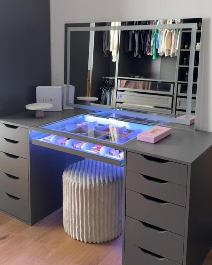 Modern gray vanity setup with LED lighting from @_fat.jona featuring illuminated storage compartments.