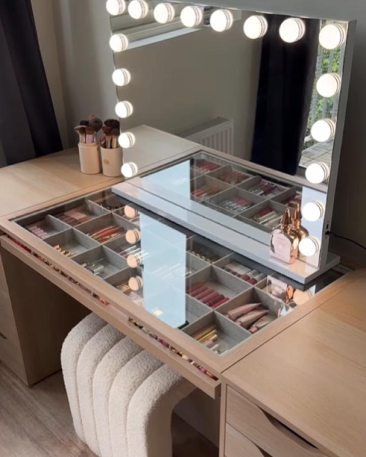 White vanity setup from @maison_patchouli showcasing ikea vanity hacks & ideas with transparent glass storage compartments.