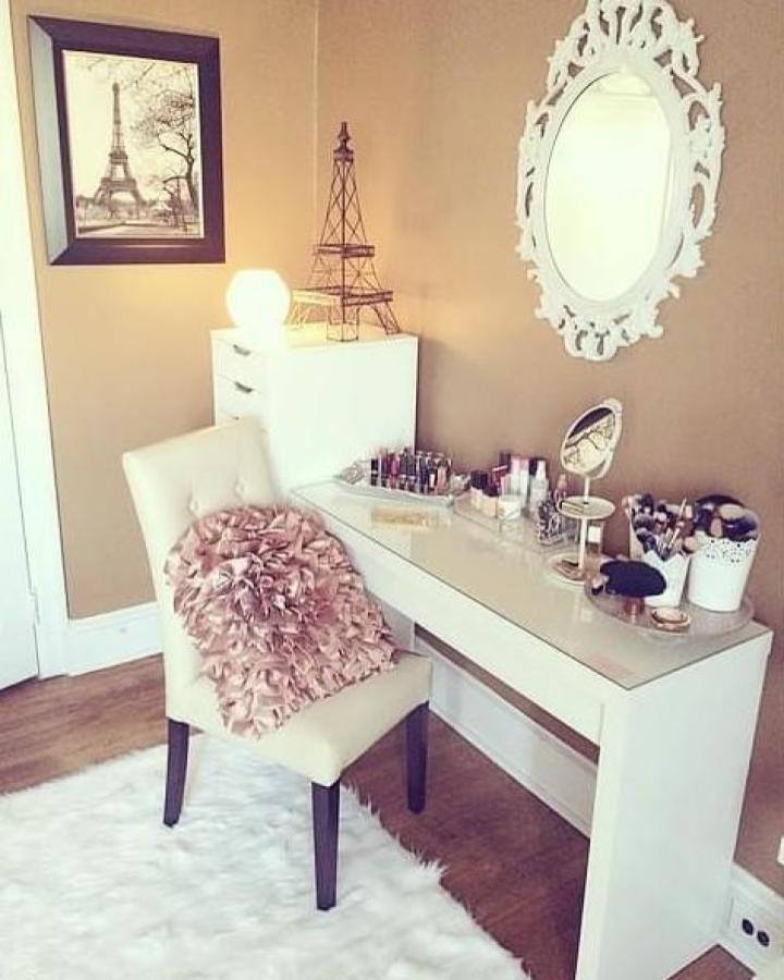 White vanity setup from @itsjulianna_a. Ornate decorative mirror elevates basic Malm dressing table with Parisian decor theme.