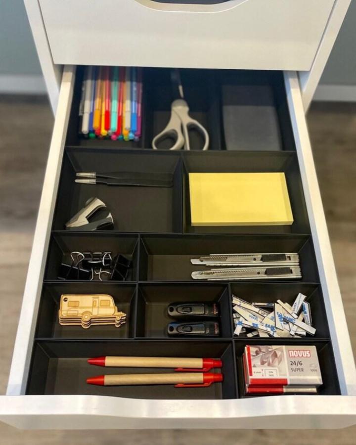 Black compartment organizer drawer from grinchify showcasing organized ikea craft room ideas with divided sections for supplies