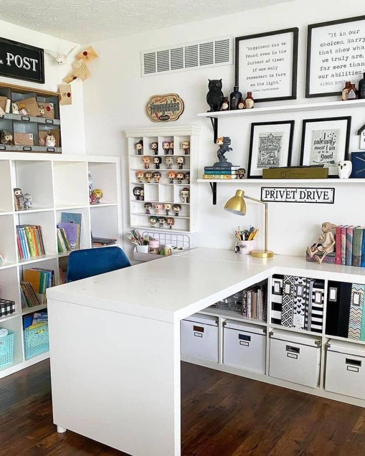 White modular storage and desk setup from @smartfundiy. Collectibles displayed on open shelving with organized bins.
