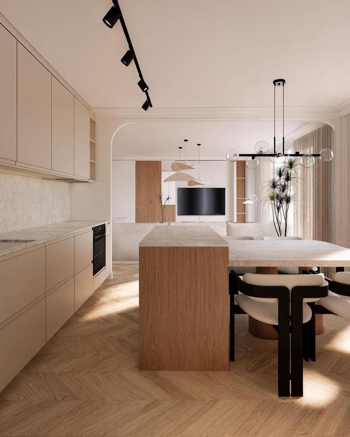 Minimalist oak island with extended dining table from @kasqfr featuring cream stone countertop and black chairs.