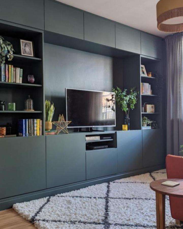Sage green Besta ikea media center hacks & ideas from @nospacelikehome.uk. Open shelving flanks flat-screen TV.
