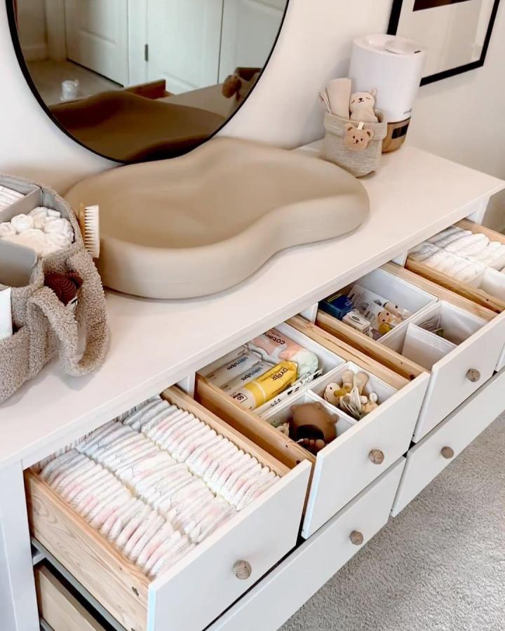 White Hemnes dresser with organized bamboo dividers from @sssedcalik. Changing pad and open drawers visible.