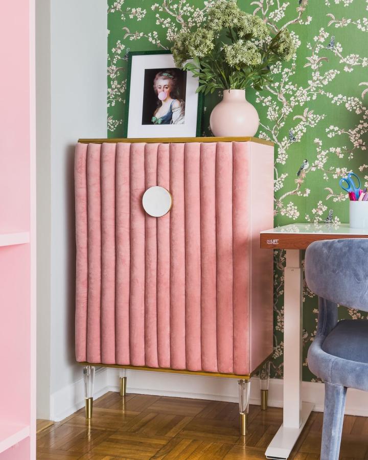 Blush velvet fluted cabinet showcasing ikea anthropologie hacks & ideas from @historyinhighheels with brass trim and acrylic legs.
