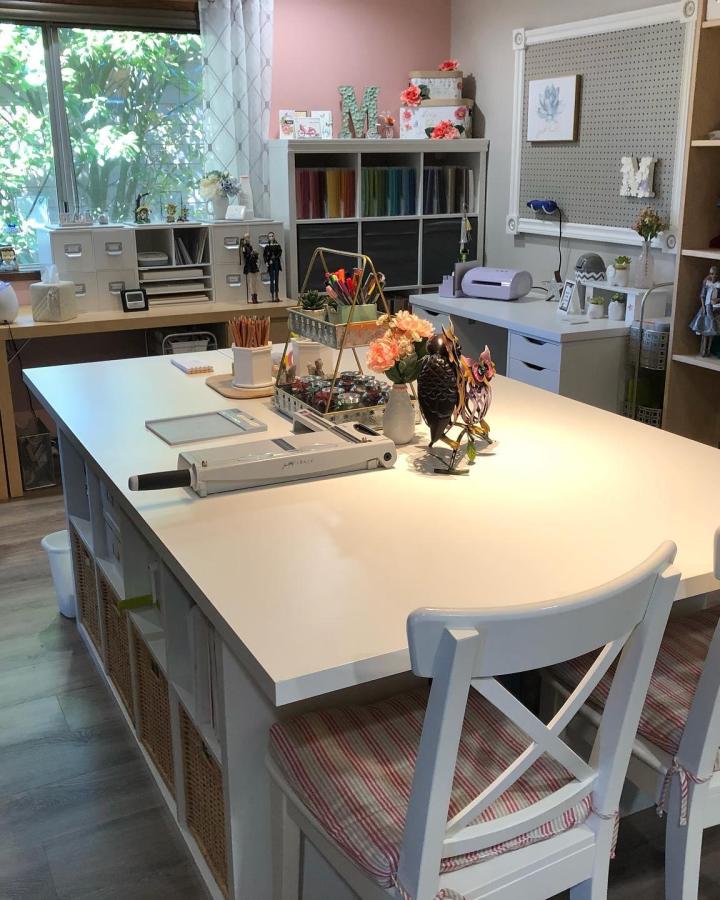 White island workspace showcasing ikea craft table hacks & ideas from @mwoerner. Double Kallax base with custom countertop.