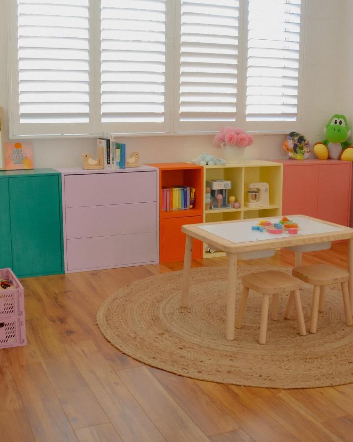 Colorful ikea playroom storage hacks & ideas from @ladyinblonde featuring Eket units in teal, pink, orange, and yellow.