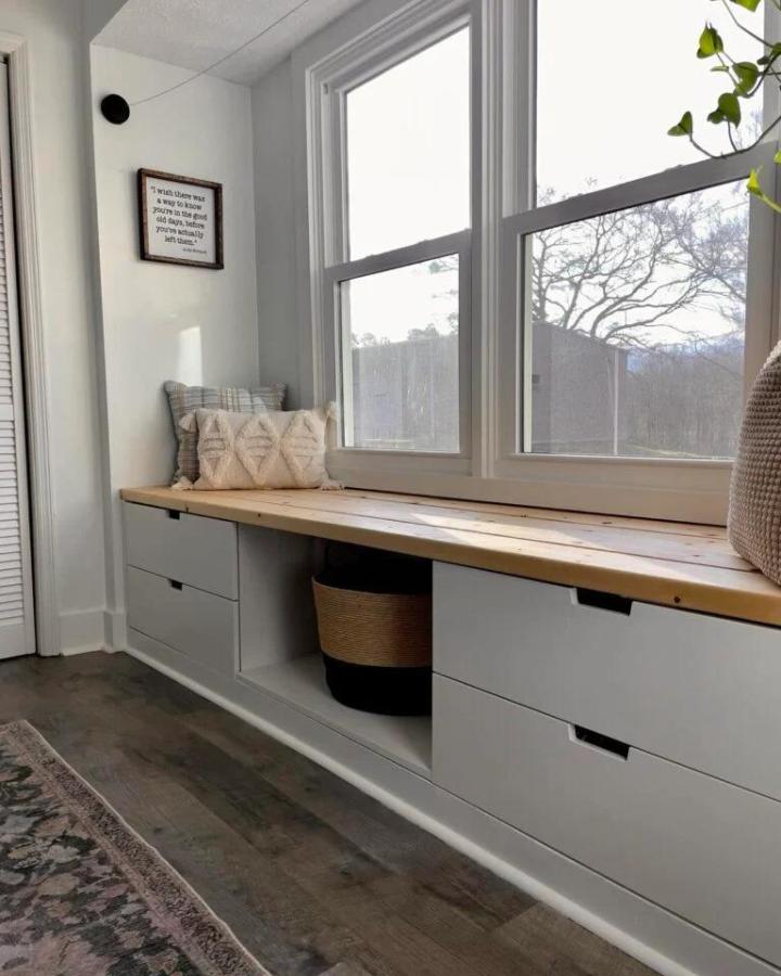 White window bench with Nordli storage from House on Austin. Natural wood top with drawer organization.