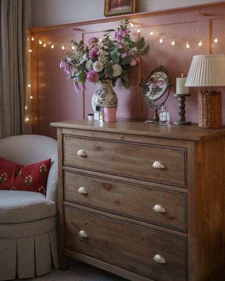 Weathered wood dresser featuring restoration hardware hacks & ideas from @pagesofemma with shell pulls and nailhead trim