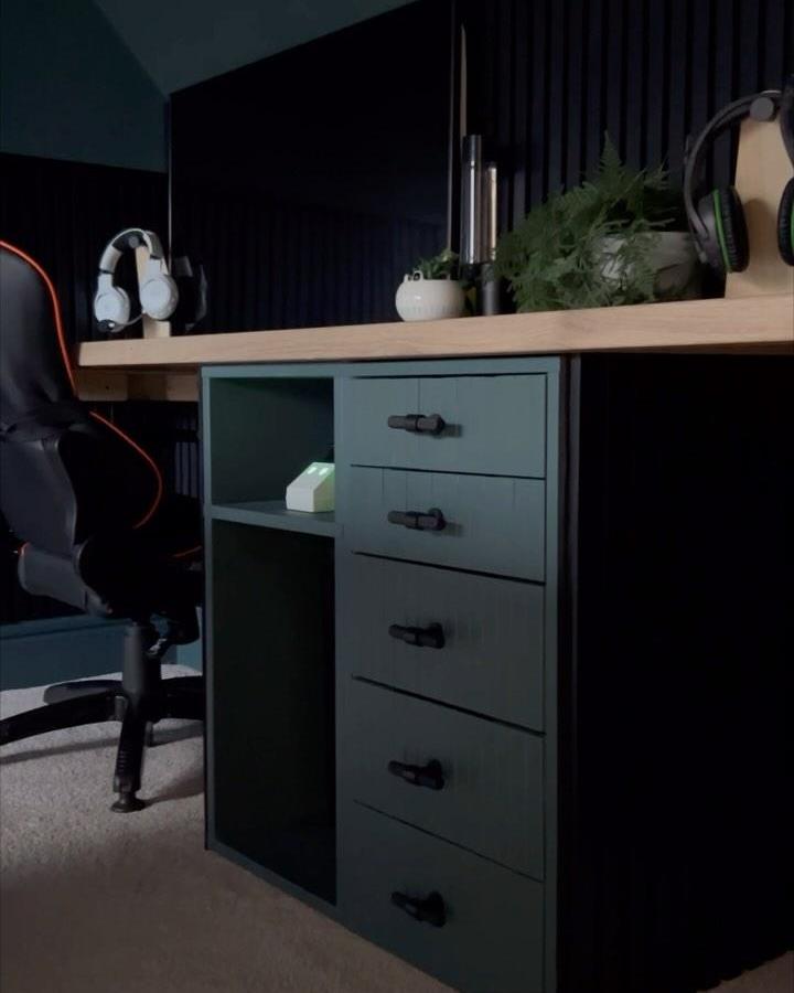 Deep matte green and natural wood ikea alex desk hacks & ideas from @klk.interiors with modern black strap handles and open shelving.