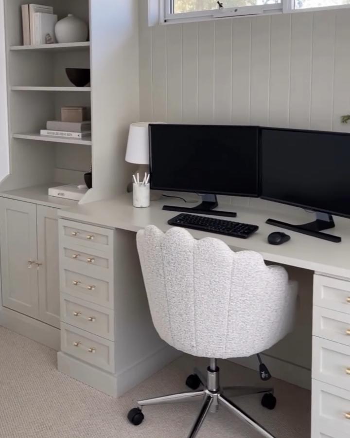 Light gray painted Ikea Alex desk hacks & ideas in home office with brass handles and scalloped white desk chair from @jo.marie_blissfulbuilds seamless built-in style