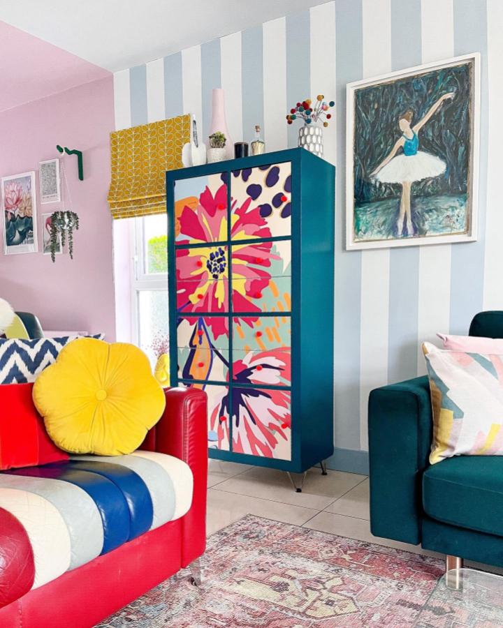 Bright floral panelled Ikea Kallax makeover ideas cabinet in a colorful living room from @hilaryscolourfulhome. Vibrant and artistic storage solution.