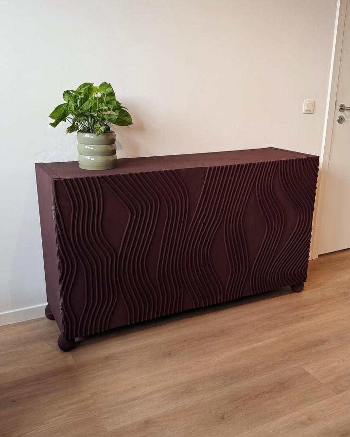 Deep plum textured front panel Ikea Kallax makeover ideas sideboard from @homeinspiration_bymt with wavy sculptural design and rounded feet.