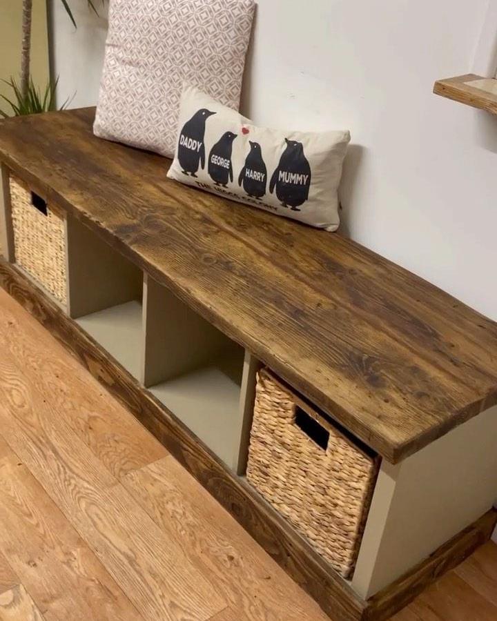 Worn wood topped Ikea kallax styling ideas bench from @do.it.yourself.mum with woven baskets and cozy cushions.