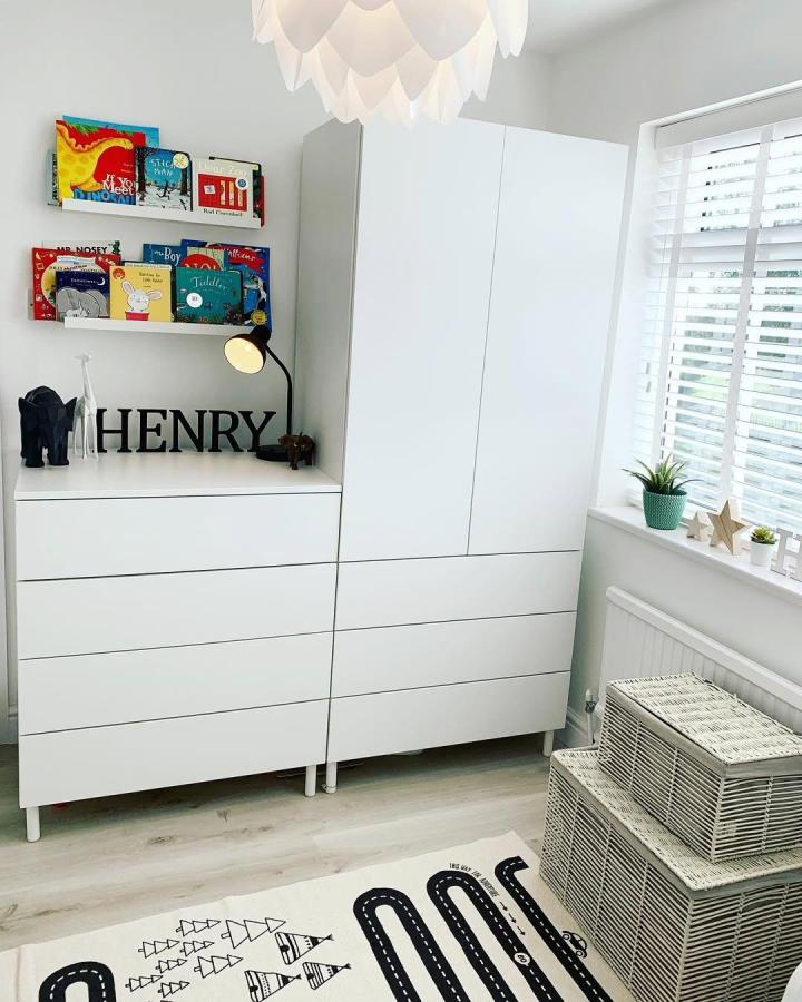 White minimalist wardrobe set with drawers and shelves from @hallbster_home. Clean lines for ikea kids wardrobe ideas.