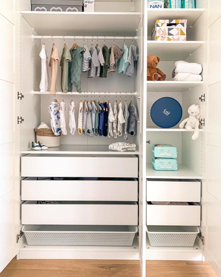 White modern double-rod kids wardrobe from @magda.pytkowska with shelves and drawers for ikea kids wardrobe ideas.