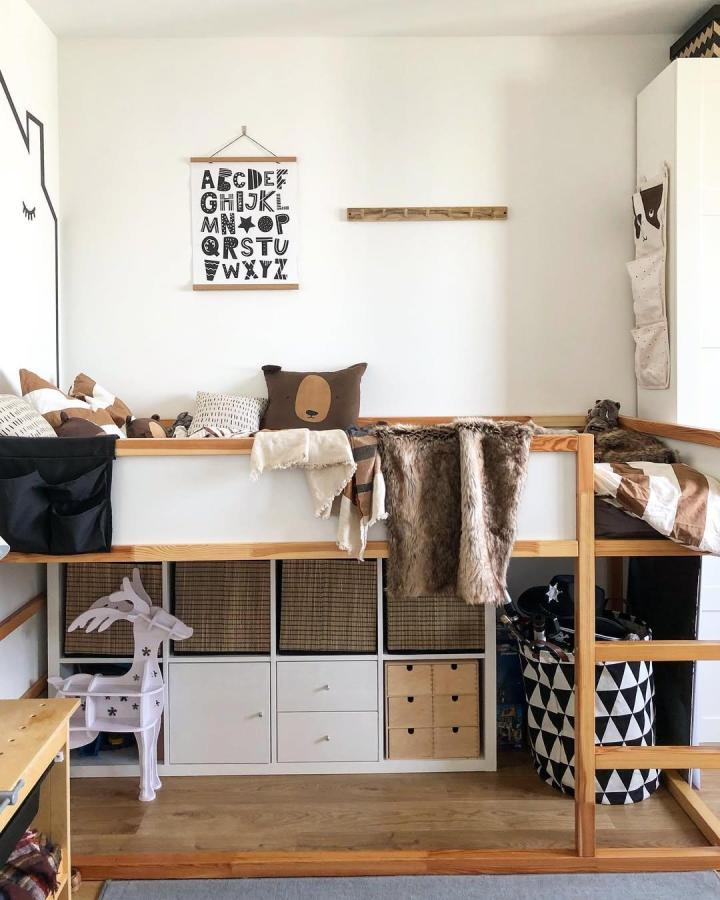 Natural wood framed storage and woven baskets in a kids room from @moshtakova showcasing ikea kids wardrobe ideas with cozy textures.