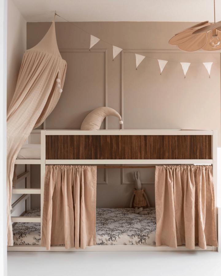 Beige curtain and wood panel triple sleeper ikea kura bed ideas for small rooms by @styleandsugar with cozy canopy and soft textures.