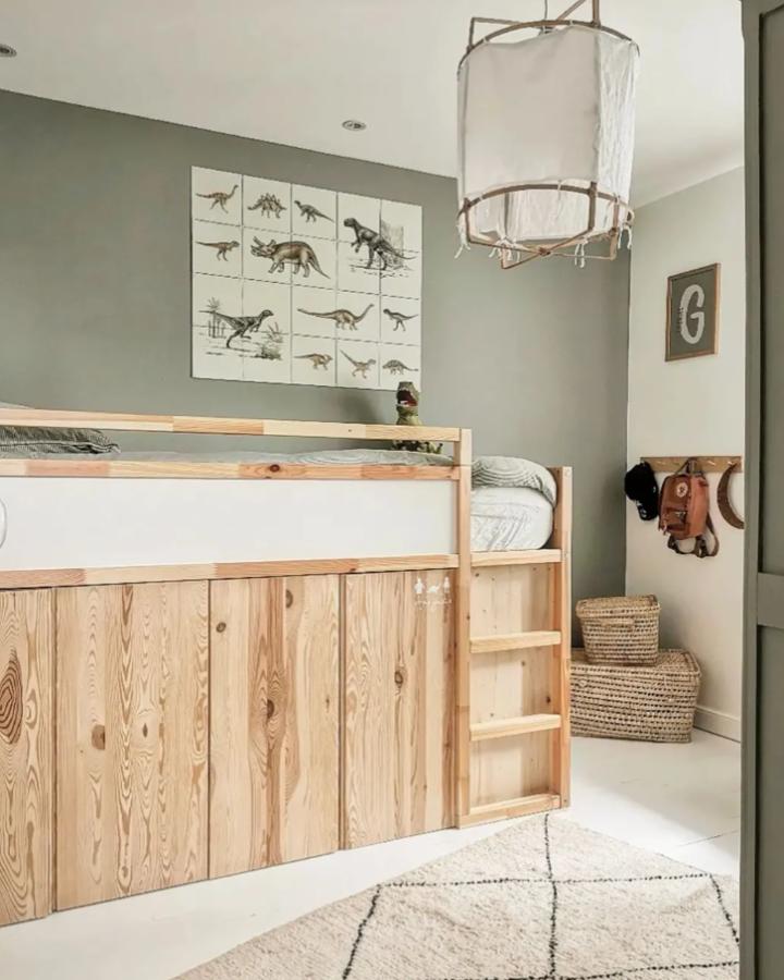 Natural pine wood Ikea kura bed with built-in storage from @coco_homedeco in a bright, small room setting.