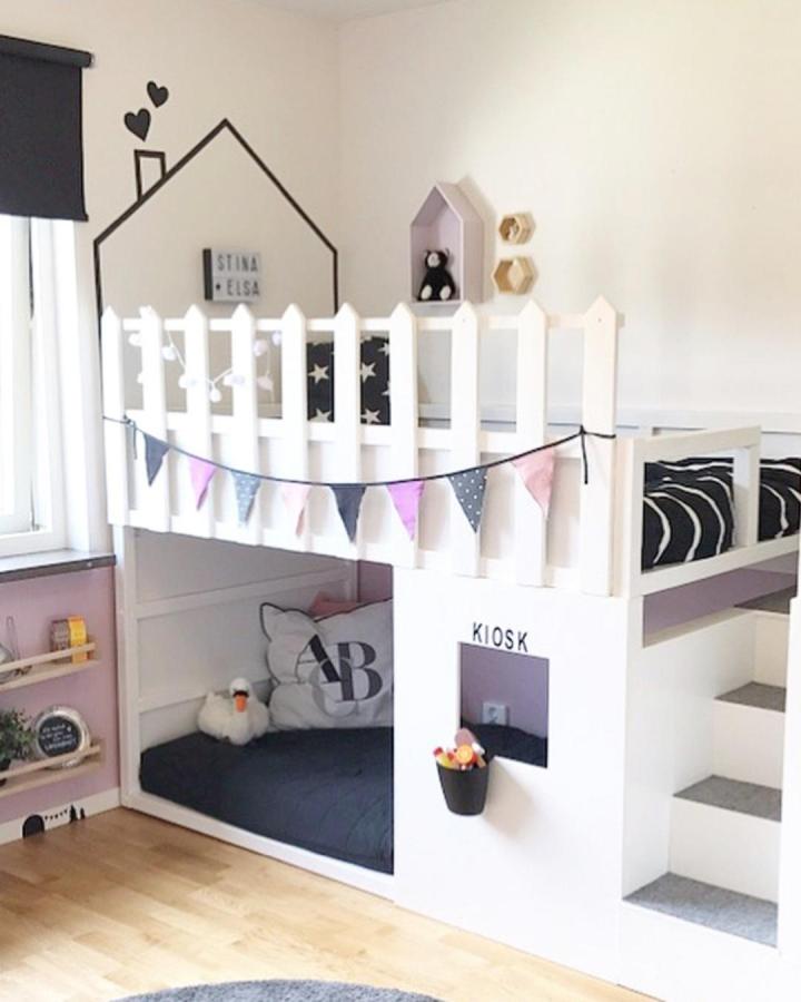 White picket fence style ikea kura bed ideas for small rooms with cozy nook and play kiosk by @pysslat.