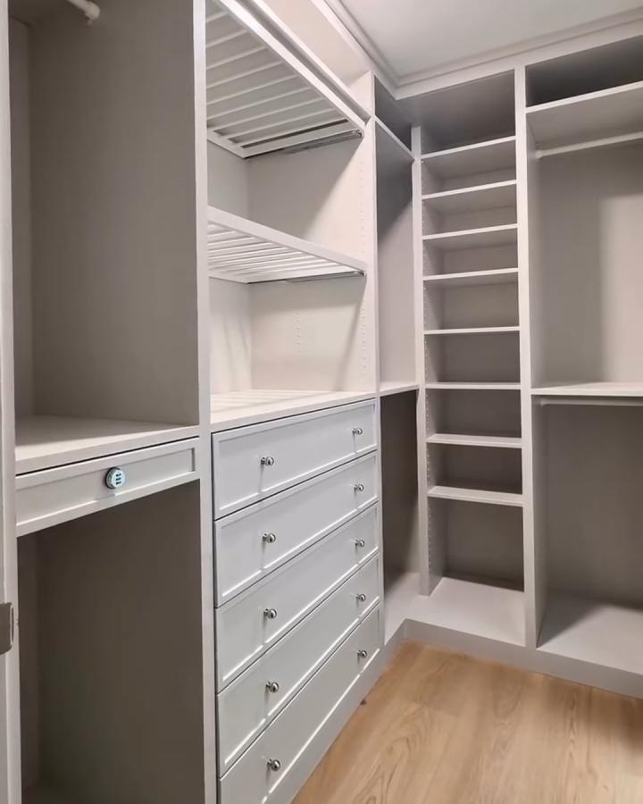 Light gray custom drawers and open shelving in a walk-in closet from @highpinehome showing ikea pax hacks for walk-in closets with functional modern design.