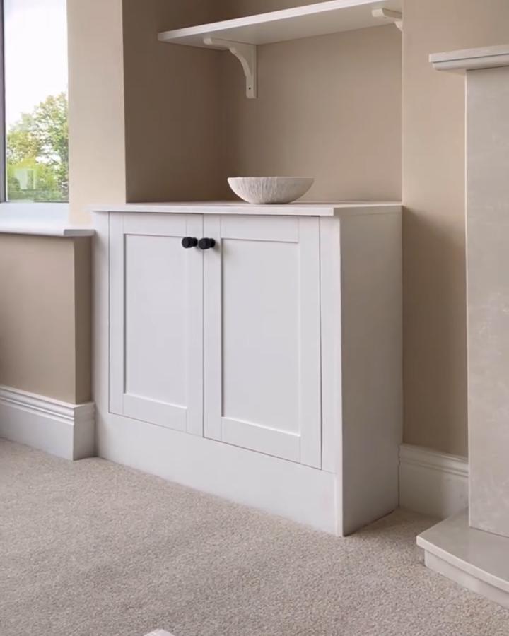 White Shaker-style cabinet in a narrow alcove with black knobs from @haswellhouse using ikea platsa hacks for awkward alcoves.