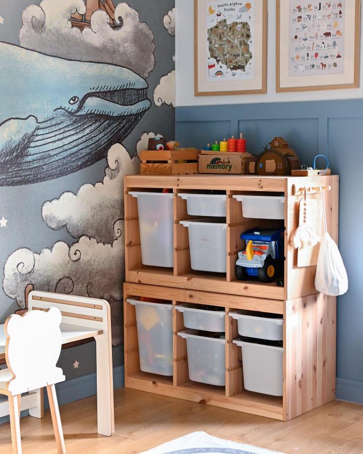 Natural pine ikea trofast playroom ideas storage unit with clear bins and toy display from @frejkove in cozy kids room corner
