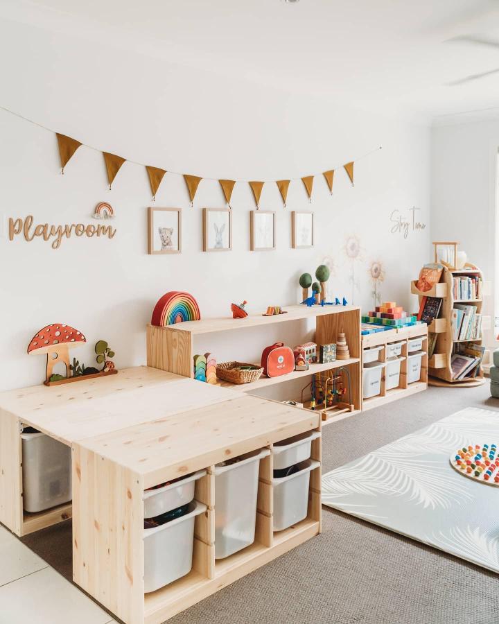 Natural pine wood Trofast play table and storage bins from @gemma.leigh.r warm and organized ikea trofast playroom ideas