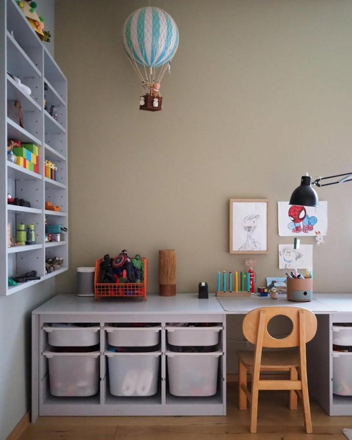 Gray and white ikea trofast playroom ideas storage and desk setup by @sirlig with minimal decor and organized bins.