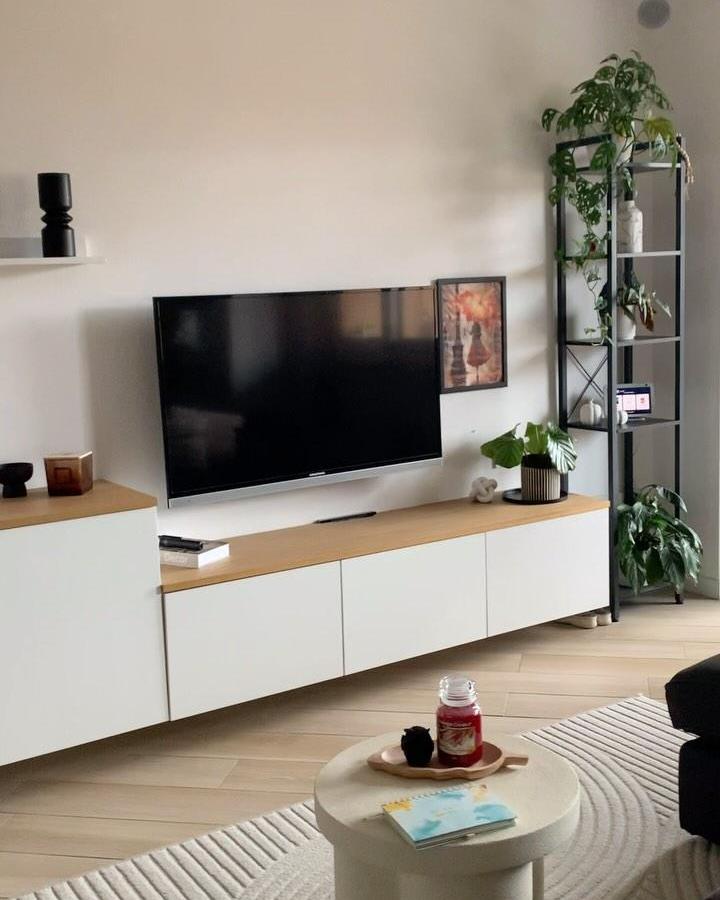 White and light wood minimalist ikea besta floating tv unit ideas from @carla_conti.allegra with plants and clean modern styling.