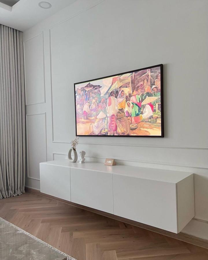 White floating ikea besta floating tv unit ideas from @everything.ivory with clean lines and minimalist decor in modern living room.