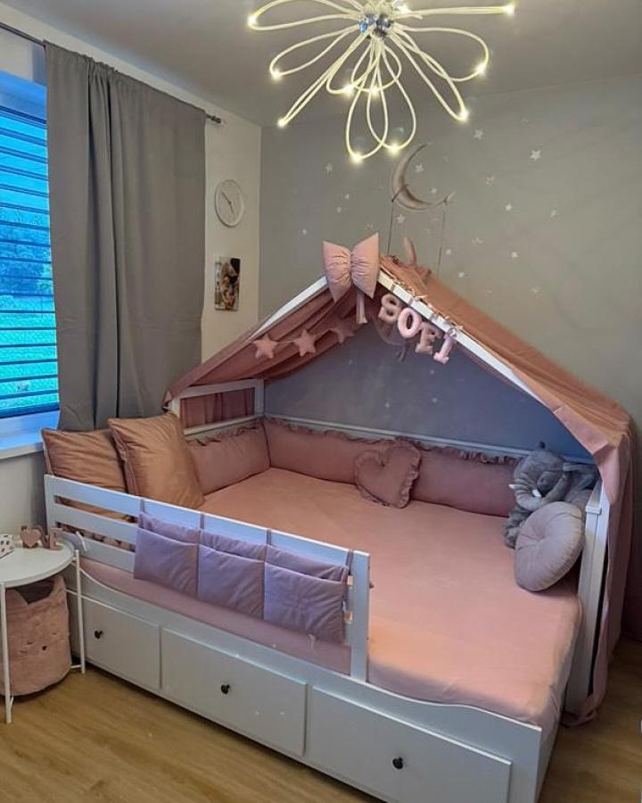 Blush pink canopy and cushions on modified ikea hemnes nursery ideas daybed by @wood_for_kids_cz with star decorations and cozy accents