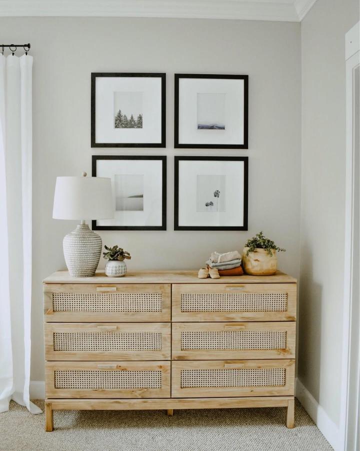 Natural wood ikea nursery dresser ideas with cane drawer fronts by @kourtnileigh soft neutral tones and simple decor.