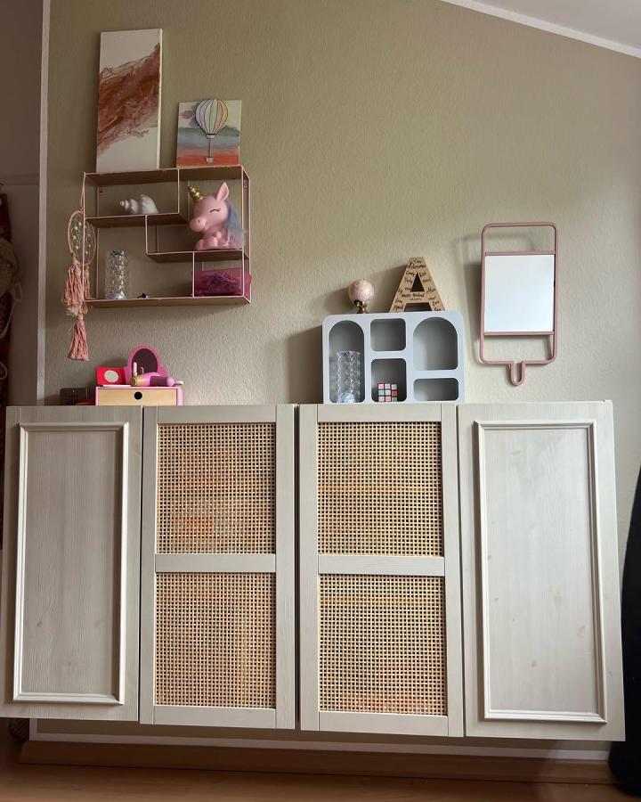 Natural rattan Ikea IVAR cabinet doors from @stohlmeieratelier with a stylish woven texture ikea ivar door hacks