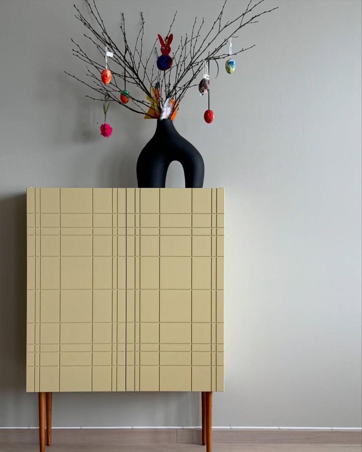 Beige Ikea Ivar cabinet with carved line pattern by @winjedesign showing creative ikea ivar door hacks in a modern room.