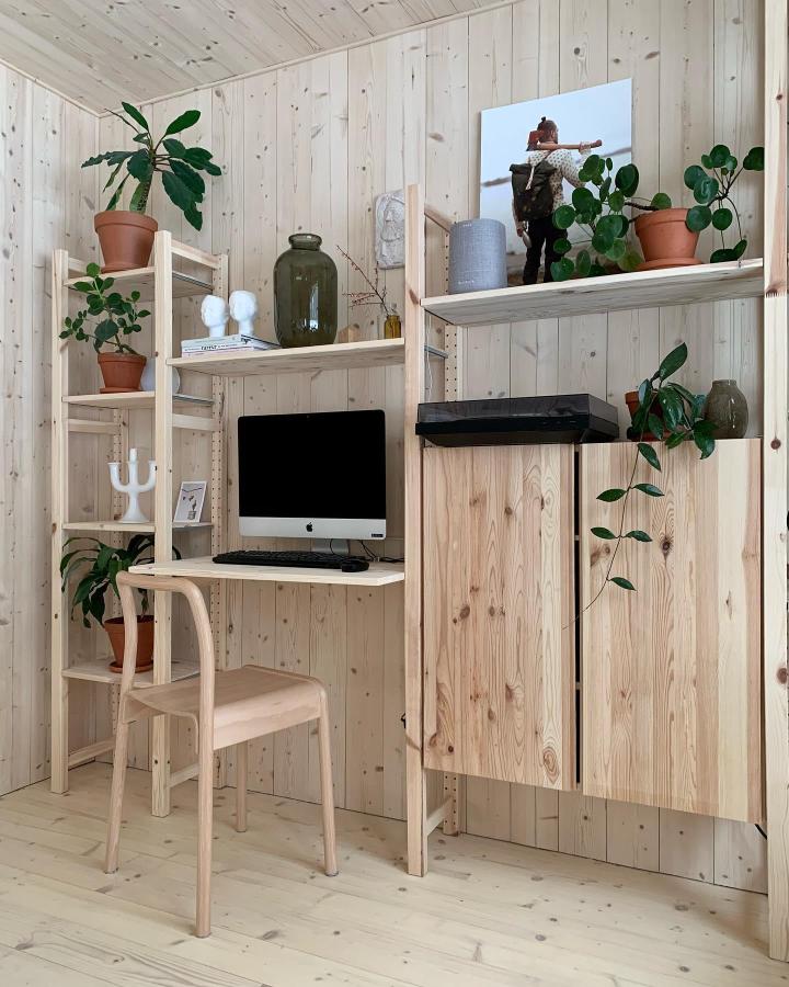 Natural pine wood office unit from @emppuhintsala featuring clean lines and storage doors perfect for Ikea ivar makeover ideas.