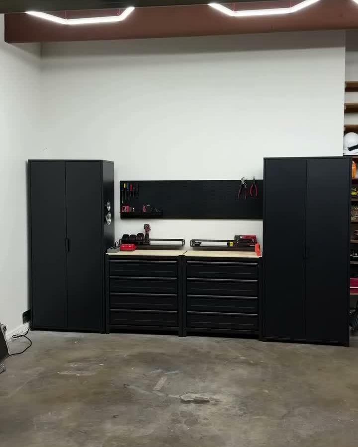 Black metal BROR shelving unit and cabinets in a garage workspace from @nicoandy with pegboard and wood countertops for tools. Clean and durable setup.