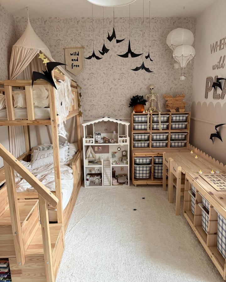 Natural pine wood KURA bunk bed and TROFAST storage bins from @nat_kowa showing cozy kids' room organization and soft fabric baskets.