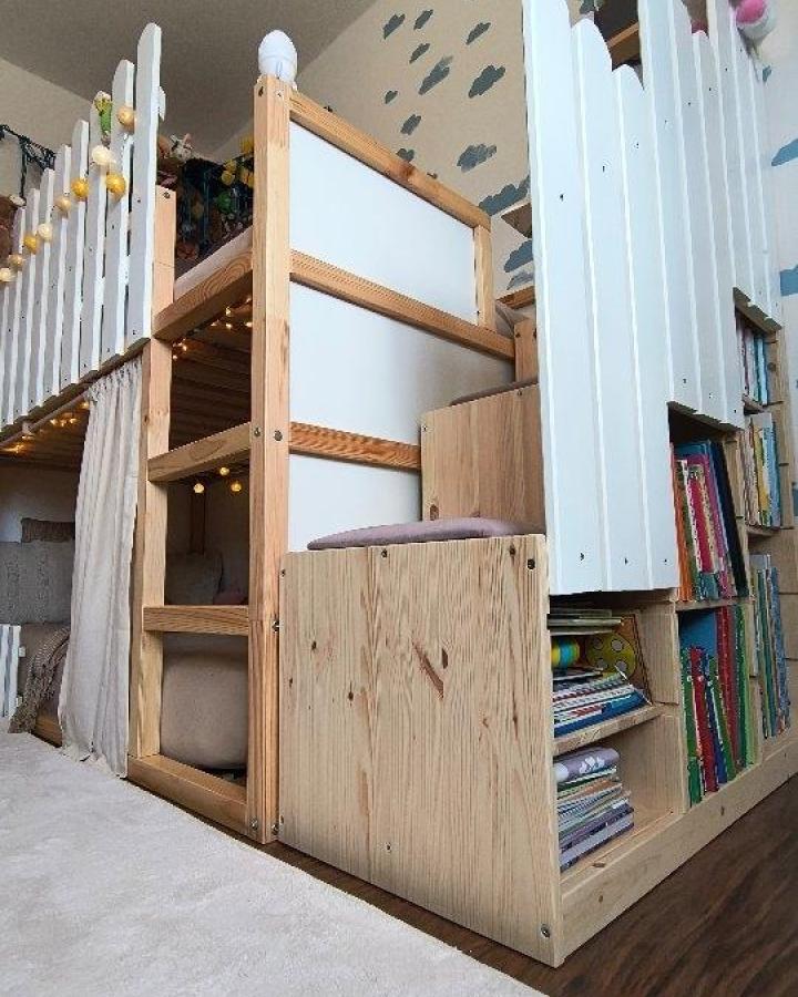 Natural wood and white panel children's loft bed with built-in storage stairs and bookshelf by @daily__dilara showing clever functional design.