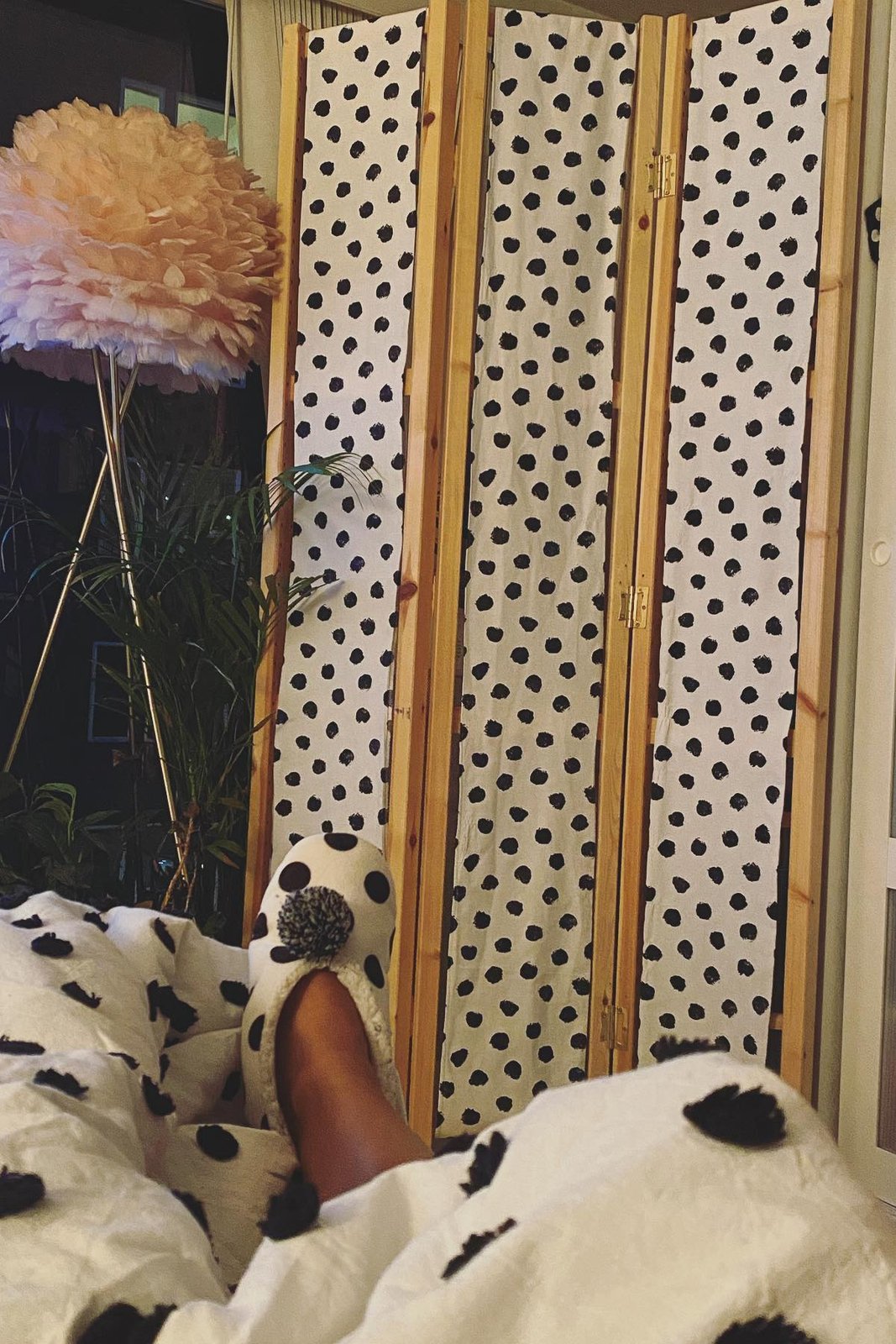 IKEA IVAR room divider with spotted fabric panels separating a cozy bedroom