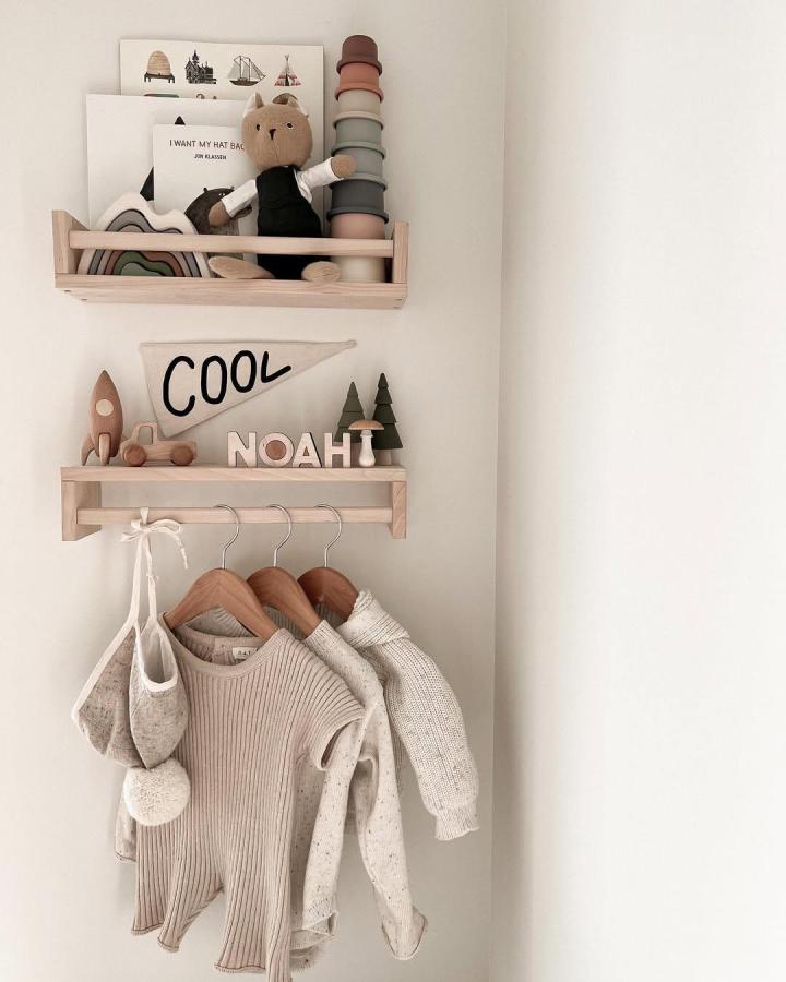 Natural wood Ikea Bekvam shelves styled with soft pastel toys and minimal decor from @heyitsshoko showcasing ikea bekvam nursery ideas.