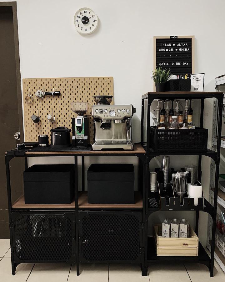 Black metal and wood IKEA coffee station with pegboard and organized shelves by @alyaa.izzaty featuring ikea coffee station ideas and practical storage solutions