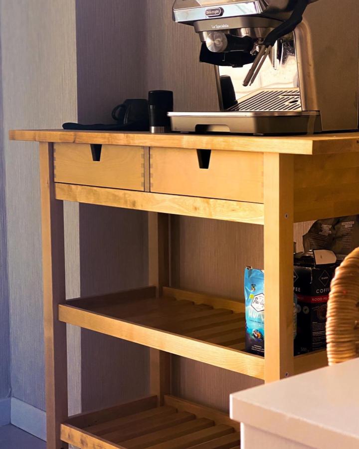 Light natural wood kitchen cart from @cllkocyigit with espresso machine and coffee supplies in a cozy home setting.