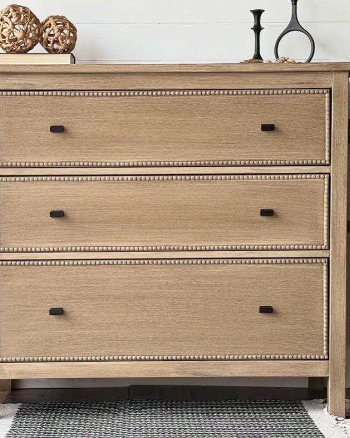 Light oak Ikea HEMNES dresser with bead trim and black hardware by @upcycle_urge showing stylish affordable classic furniture upgrade alternative.