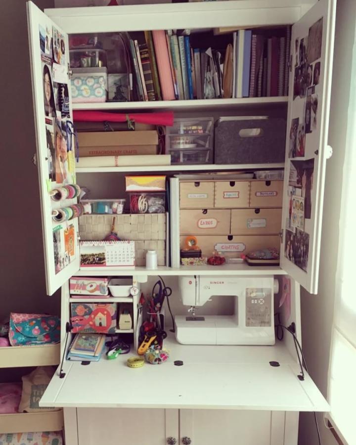 White Ikea Hemnes bureau sewing station with Raskog cart and organized storage from @craftafterbump showcasing ikea sewing table ideas for compact craft spaces.
